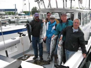 Fishing group with salmon - Big Blue Charters, Alaska