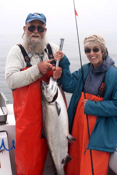 Alaska Fishing Guest with large salmon.