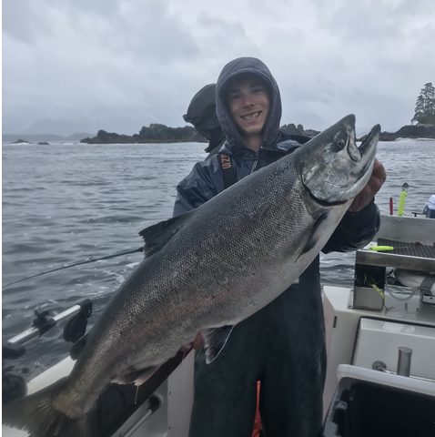 Large Alaska Salmon caught during fishing trip with Big Blue Charters