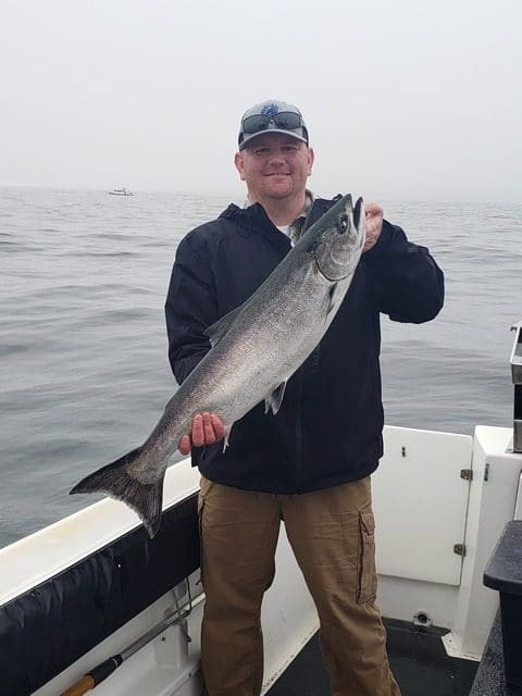 Large Salmon with Big Blue Charters, Alaska fishing charter guest.