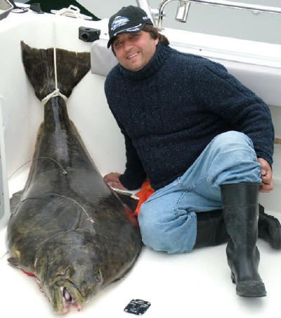 Alex with 150lb+ halibut