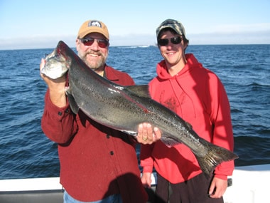 Jacob and dad fishing with Big Blue Charters, Alaska